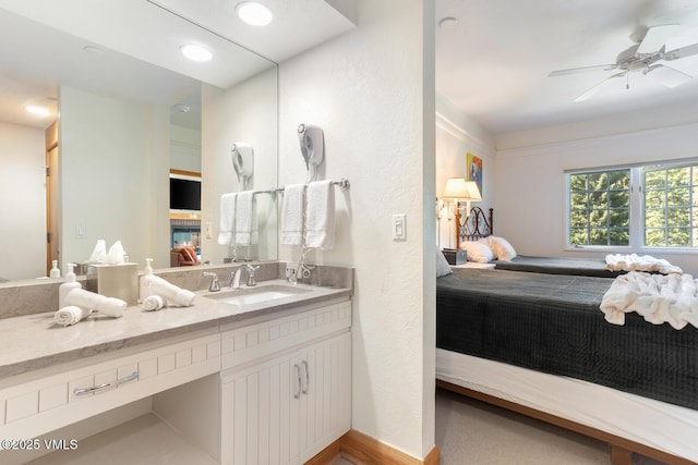 120 Offerson Rd Unit 2320, Beaver Creek, CO 81620 - bathroom featuring vanity, ceiling fan, and connected bathroom