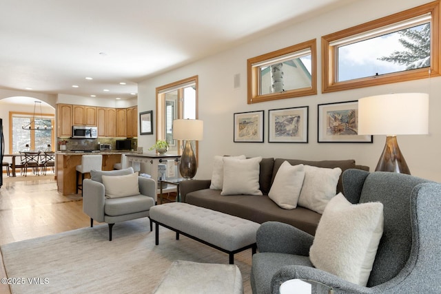 2 Anvil Cir, Edwards, CO 81632 - living room with arched walkways, recessed lighting, and light wood-style floors