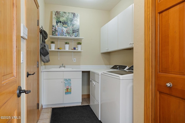 2 Anvil Cir, Edwards, CO 81632 - washroom with cabinet space, light tile patterned flooring, and independent washer and dryer