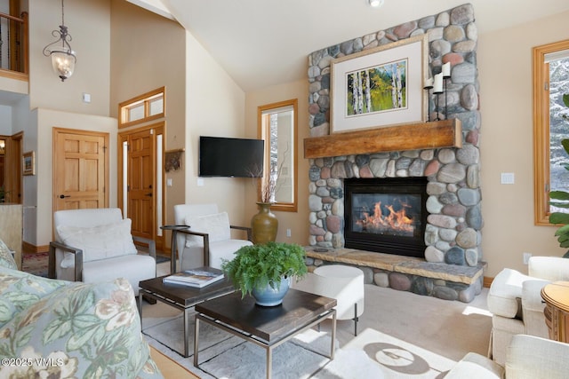 2 Anvil Cir, Edwards, CO 81632 - living room featuring a stone fireplace and vaulted ceiling