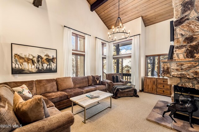 living room with wood ceiling, carpet flooring, high vaulted ceiling, and beamed ceiling