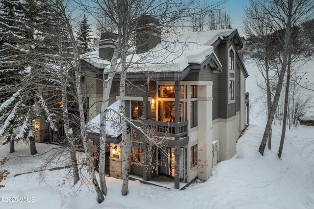 view of snow covered property