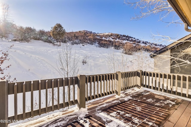 view of snow covered deck