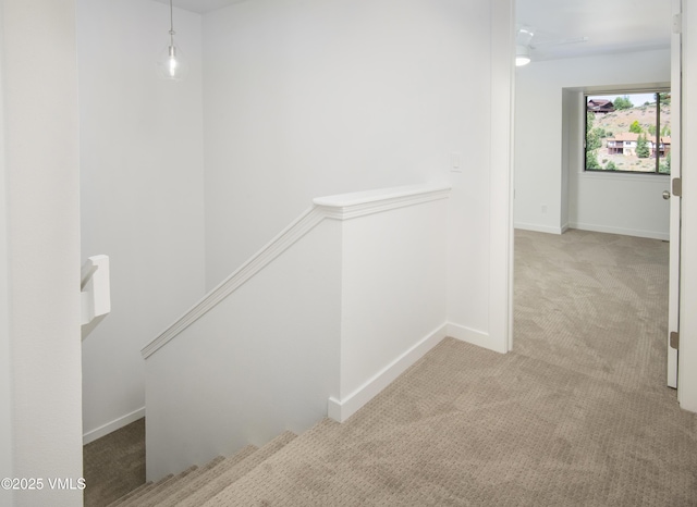 2403 Draw Spur Unit 2, Avon, CO 81620 - hallway featuring an upstairs landing and carpet