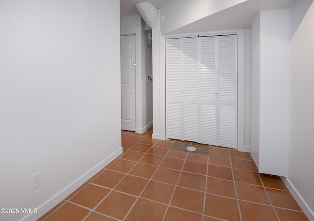 2403 Draw Spur Unit 2, Avon, CO 81620 - unfurnished bedroom featuring tile patterned flooring and a closet