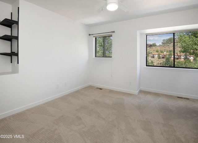 2403 Draw Spur Unit 2, Avon, CO 81620 - empty room featuring light carpet and ceiling fan