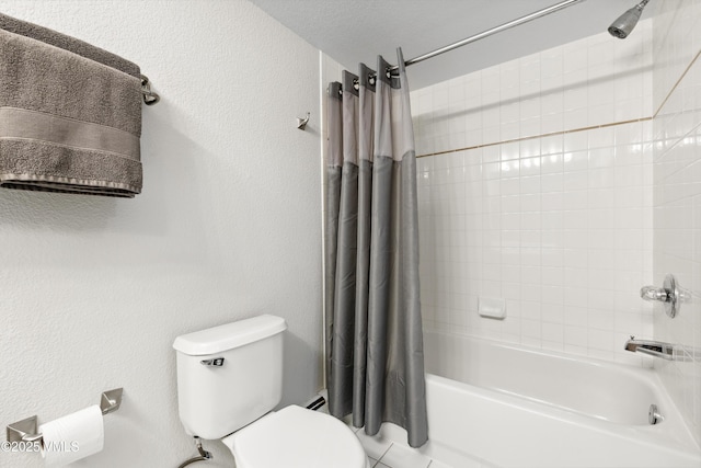 601 Crazy Horse Cir Unit 601, Edwards, CO 81632 - bathroom featuring shower / tub combo with curtain and a textured wall