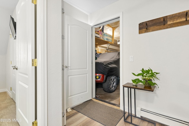 601 Crazy Horse Cir Unit 601, Edwards, CO 81632 - hall featuring a baseboard heating unit