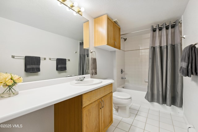 601 Crazy Horse Cir Unit 601, Edwards, CO 81632 - bathroom with vanity, tile patterned floors, shower / tub combo with curtain, and baseboard heating