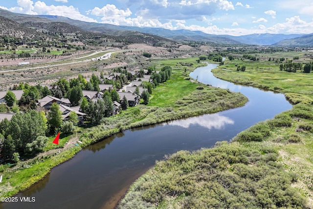 601 Crazy Horse Cir Unit 601, Edwards, CO 81632 - drone / aerial view of a water and mountain view