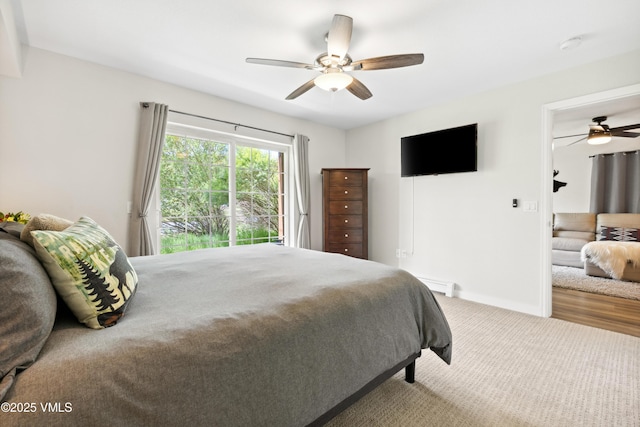 601 Crazy Horse Cir Unit 601, Edwards, CO 81632 - bedroom featuring carpet floors, a ceiling fan, and access to outside