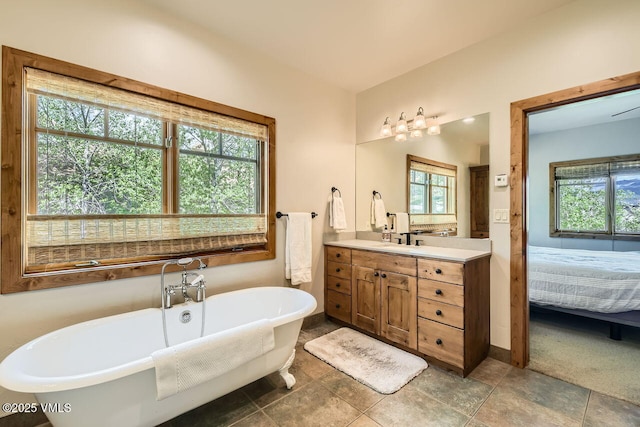 51 Silver Spur, Eagle, CO 81631 - bathroom with a freestanding bath, ensuite bathroom, vanity, and baseboards