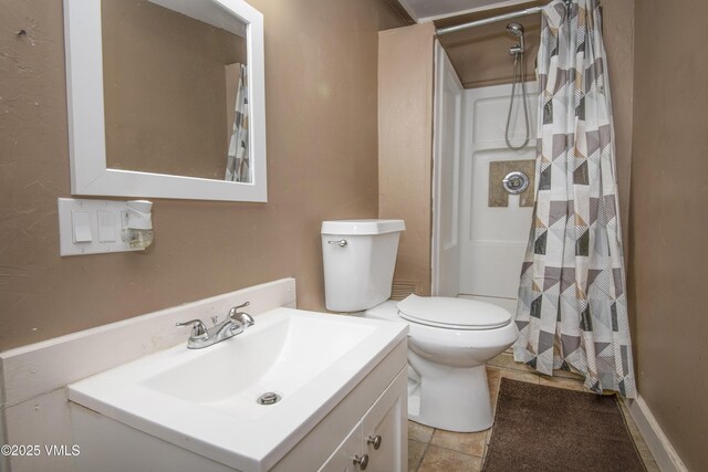 bathroom featuring walk in shower, vanity, and toilet