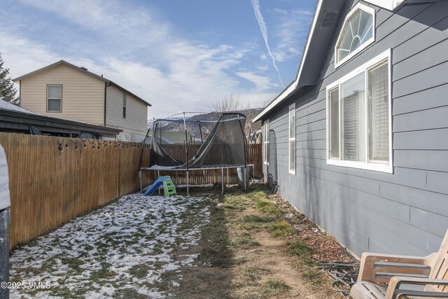 view of yard featuring a trampoline