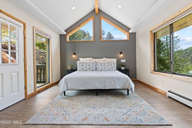 2980 Salt Creek Rd, Eagle, CO 81631 - bedroom with wood finished floors, access to outside, and baseboard heating