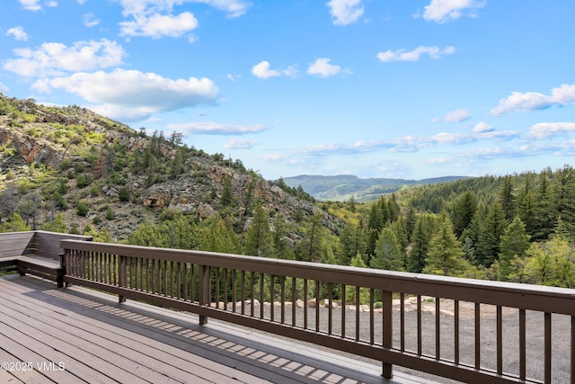 2980 Salt Creek Rd, Eagle, CO 81631 - wooden deck featuring a mountain view and a wooded view