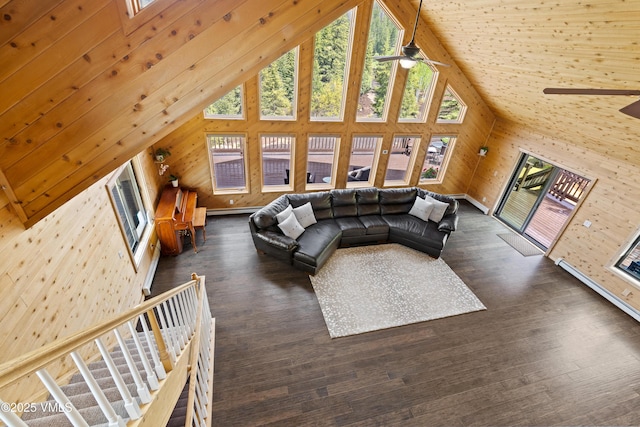 2980 Salt Creek Rd, Eagle, CO 81631 - living area with ceiling fan, high vaulted ceiling, wood finished floors, and wooden walls