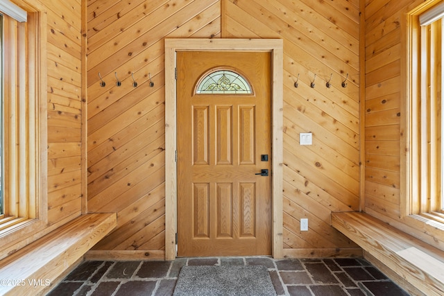 2980 Salt Creek Rd, Eagle, CO 81631 - foyer featuring brick floors and wood walls