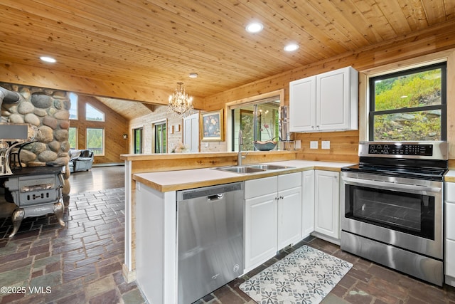 2980 Salt Creek Rd, Eagle, CO 81631 - kitchen with stainless steel appliances, wood ceiling, open floor plan, a peninsula, and recessed lighting
