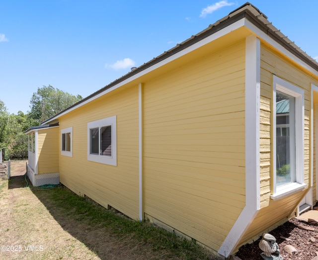 423 Second St, Gypsum, CO 81637 - view of side of property with a lawn