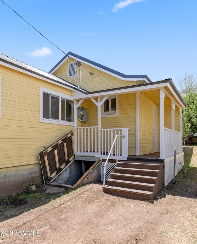 423 Second St, Gypsum, CO 81637 - rear view of house featuring a porch