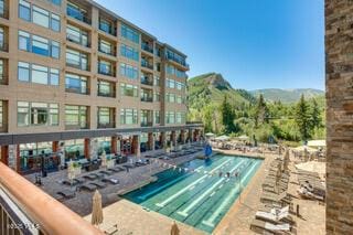42 Riverfront Ln Unit 205, Avon, CO 81620 - view of pool featuring a mountain view