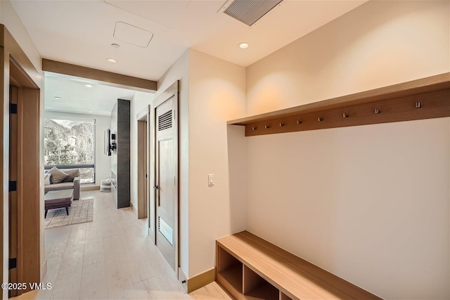 42 Riverfront Ln Unit 205, Avon, CO 81620 - mudroom featuring light wood-style floors and recessed lighting