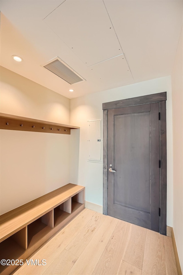 42 Riverfront Ln Unit 205, Avon, CO 81620 - mudroom featuring electric panel, wood finished floors, and recessed lighting