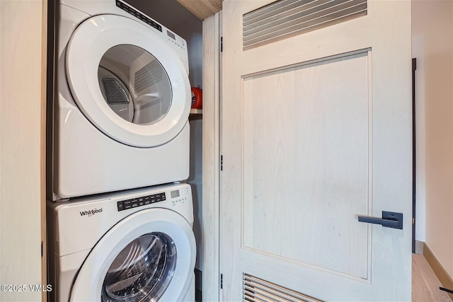 42 Riverfront Ln Unit 205, Avon, CO 81620 - laundry room with stacked washer / drying machine