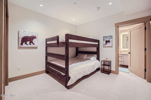 42 Riverfront Ln Unit 205, Avon, CO 81620 - carpeted bedroom with recessed lighting and ensuite bathroom