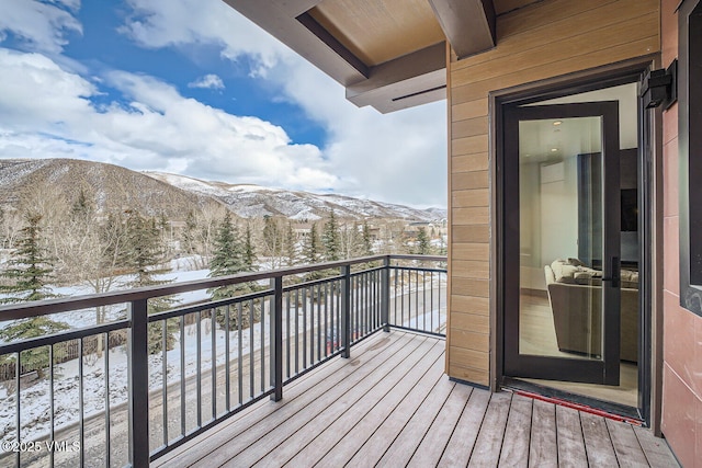 42 Riverfront Ln Unit 205, Avon, CO 81620 - snow covered back of property featuring a mountain view
