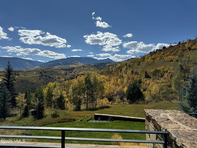 mountain view featuring a rural view