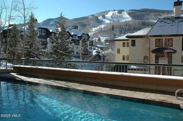 180 Offerson Rd Unit 2, Beaver Creek, CO 81620 - snow covered pool featuring a mountain view