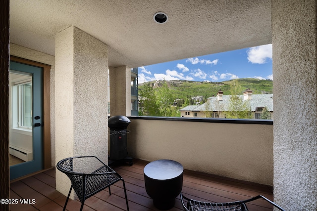 180 Offerson Rd Unit 2, Beaver Creek, CO 81620 - balcony featuring a baseboard heating unit, grilling area, and a mountain view