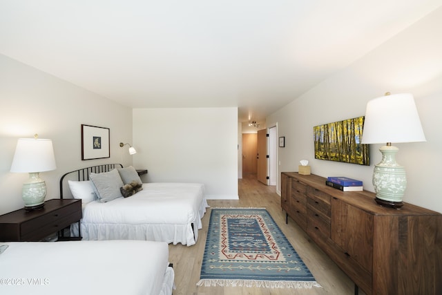 180 Offerson Rd Unit 2, Beaver Creek, CO 81620 - bedroom featuring light wood-style floors and baseboards
