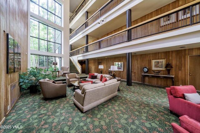 180 Offerson Rd Unit 2, Beaver Creek, CO 81620 - building lobby with a high ceiling, wood walls, and stairway
