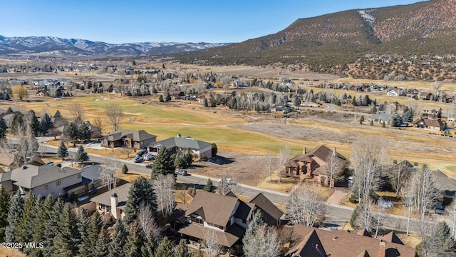 aerial view featuring a mountain view and a residential view