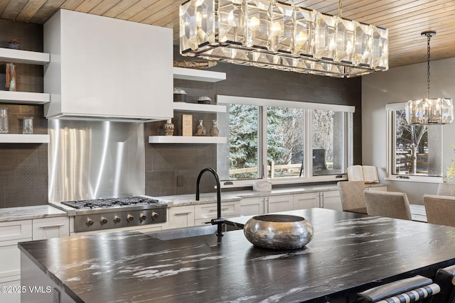 kitchen featuring wood ceiling, open shelves, and a wealth of natural light