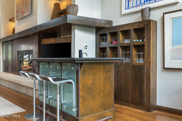 266 Sawatch Dr, Edwards, CO 81632 - bar with wood finished floors and baseboards