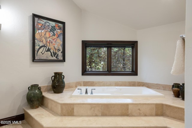 266 Sawatch Dr, Edwards, CO 81632 - bathroom with a garden tub and lofted ceiling