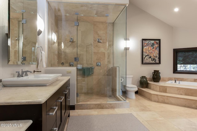266 Sawatch Dr, Edwards, CO 81632 - full bathroom featuring vanity, a shower stall, a bath, recessed lighting, and vaulted ceiling