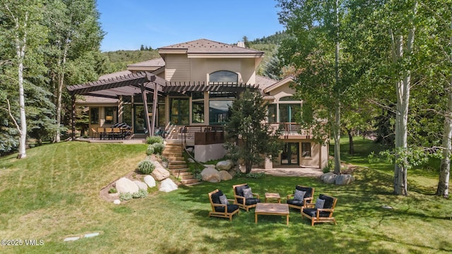 266 Sawatch Dr, Edwards, CO 81632 - rear view of property with a pergola, an outdoor living space, a lawn, a patio area, and stairs