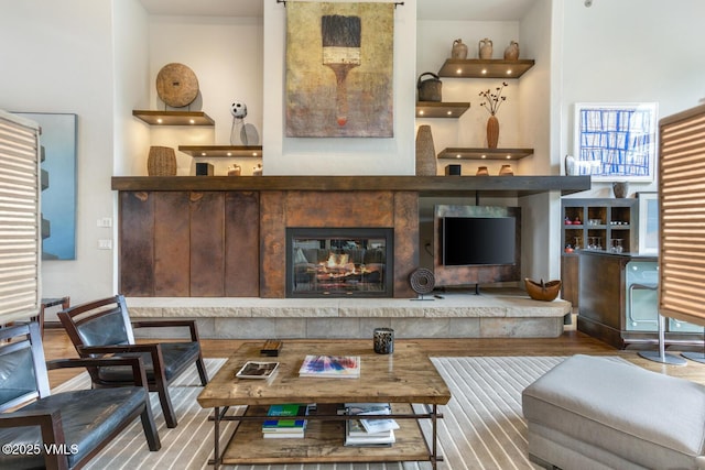 266 Sawatch Dr, Edwards, CO 81632 - living area with wood finished floors and a glass covered fireplace