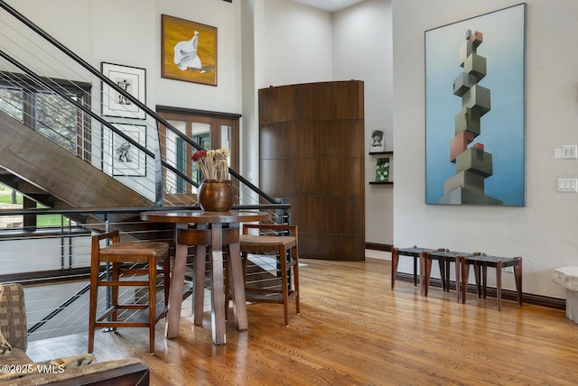 266 Sawatch Dr, Edwards, CO 81632 - dining area featuring wood finished floors and stairs
