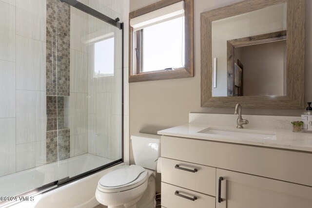 216 Monument St, Red Cliff, CO 81649 - full bathroom featuring vanity and shower / bath combination with glass door