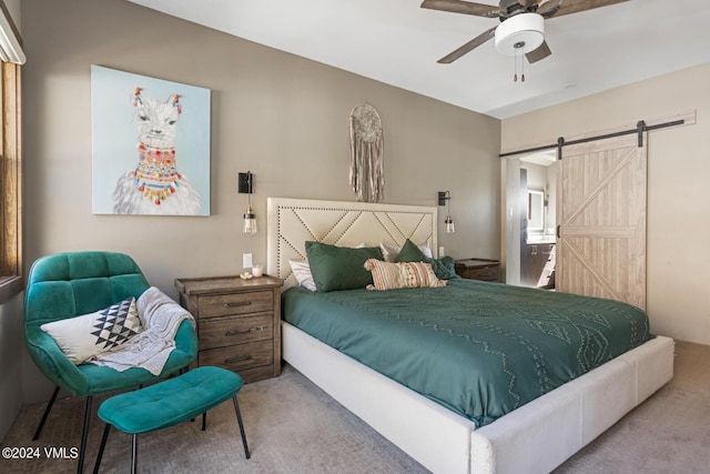 216 Monument St, Red Cliff, CO 81649 - bedroom featuring a barn door, carpet flooring, and ceiling fan