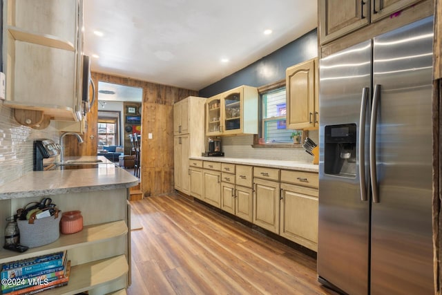216 Monument St, Red Cliff, CO 81649 - kitchen with stainless steel fridge with ice dispenser, tasteful backsplash, light wood-style floors, open shelves, and light countertops
