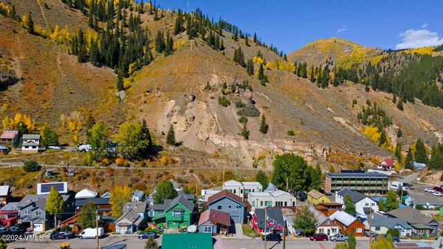 216 Monument St, Red Cliff, CO 81649 - aerial perspective of suburban area featuring mountains