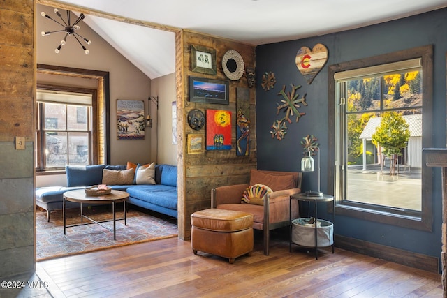 216 Monument St, Red Cliff, CO 81649 - sitting room with wood-type flooring, plenty of natural light, and lofted ceiling