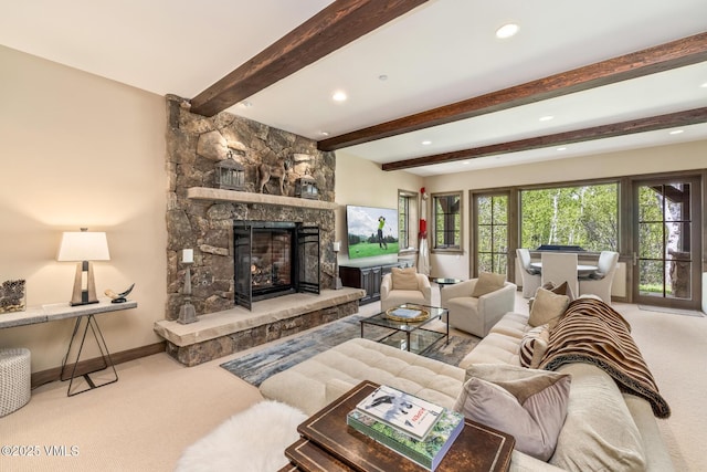 348 Red Draw, Edwards, CO 81632 - living area featuring carpet flooring, a fireplace, beamed ceiling, recessed lighting, and baseboards